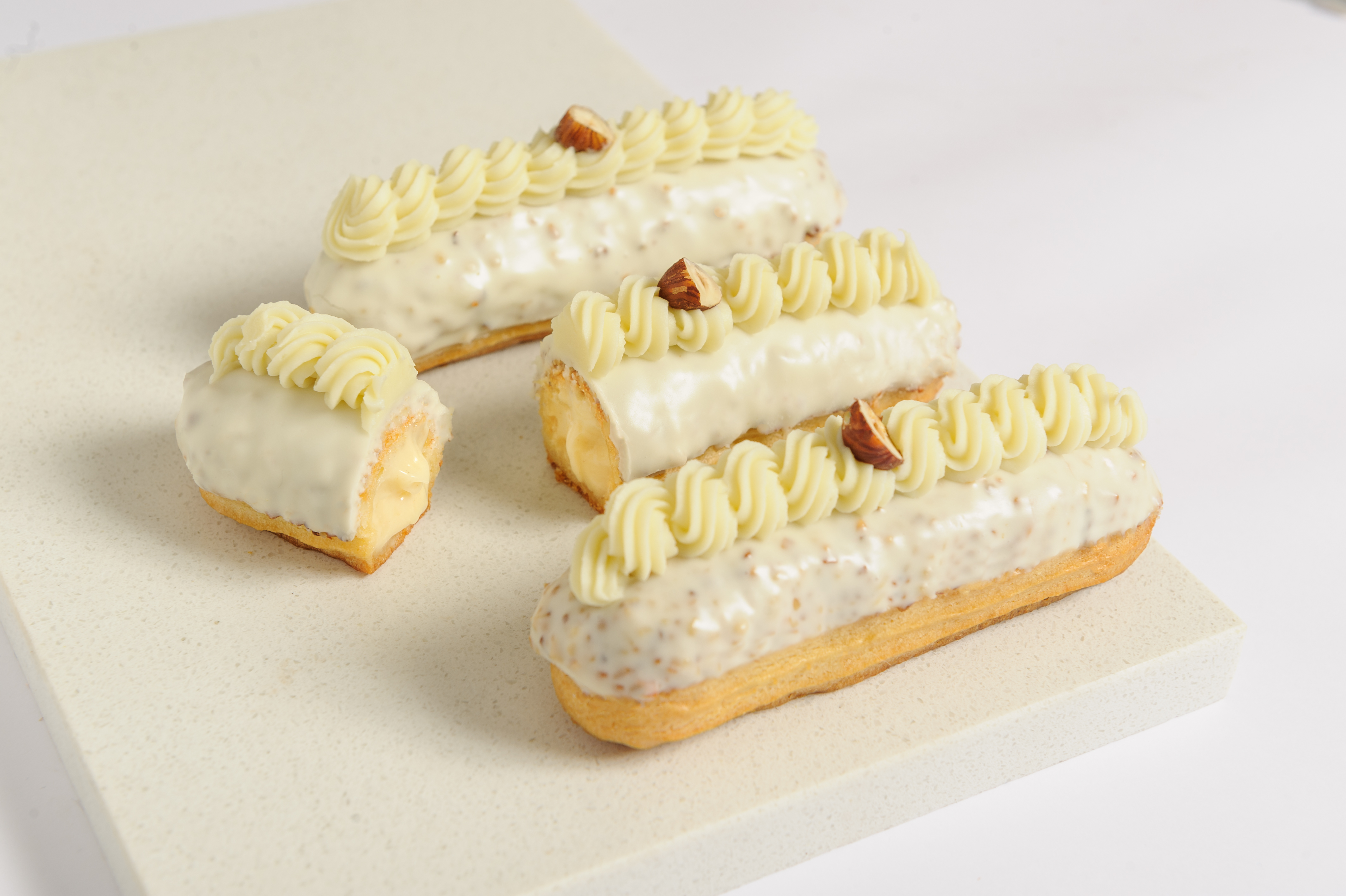 Éclair de chocolate branco com